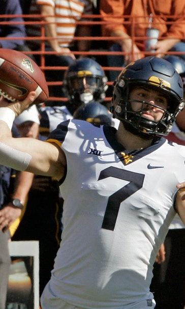 Grier 2-point conversion run sends West Virginia over Texas
